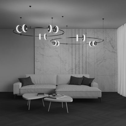Modern living room with a gray sofa, coffee table, and decorative track lighting.